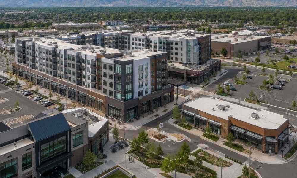 Colorado mixed use development | ALTA Land Survey A mixed use development in Colorado with apartments, retail spaces, parking areas, and shared access documented for an ALTA survey
