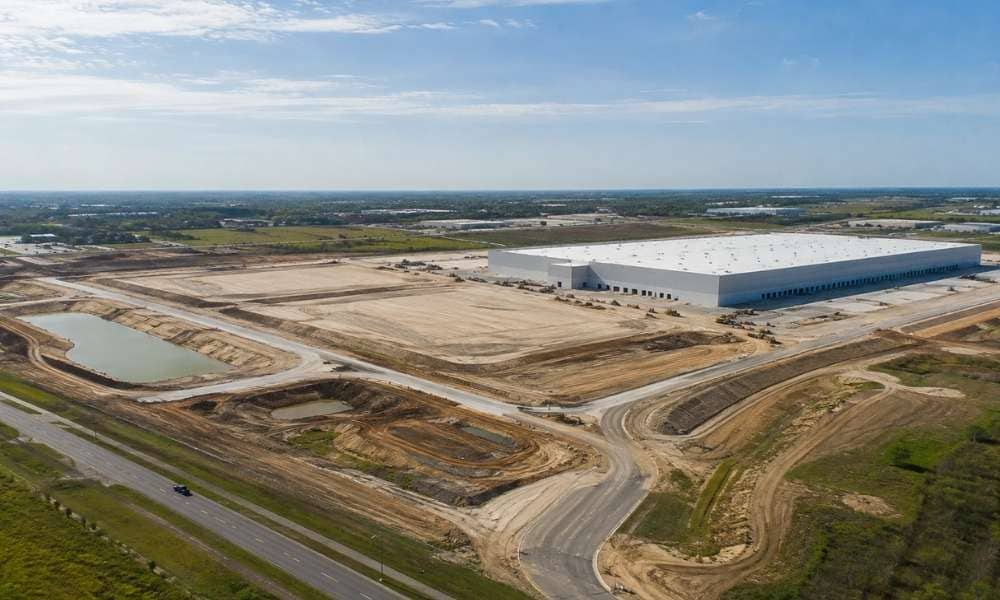 Texas commercial development alta survey industrial warehouse site | ALTA Land Survey Aerial view of texas commercial development project with industrial warehouse and large land site for alta survey planning