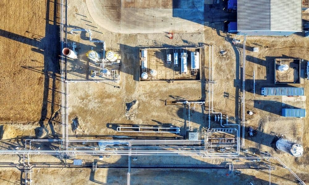 Alta survey advanced manufacturing sites | ALTA Land Survey Aerial view of an industrial facility with pipelines, utility infrastructure, tanks, and equipment, highlighting site features relevant to an ALTA survey