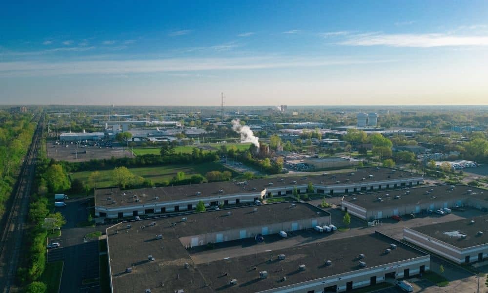 Alta survey commercial parcel assemblies | ALTA Land Survey Aerial view of commercial and industrial buildings, parking areas, and surrounding property associated with an ALTA survey for commercial parcel assemblies